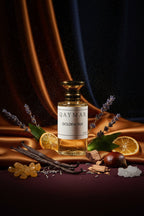 Small bottle labeled 'QAYMAR Golden Silk' on a dark textured surface