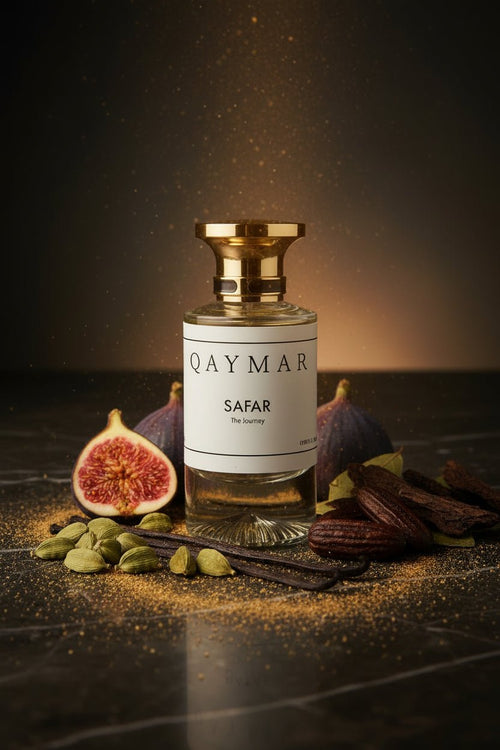 Extrait Perfume bottle 'Qaymar Safar' a premium perfume with a amber woody spicy scent and fig and cardamom for the base. Long lasting perfumes